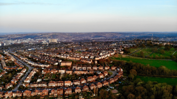 Aerial view of Sheffield homes on a clear afternoon at dusk