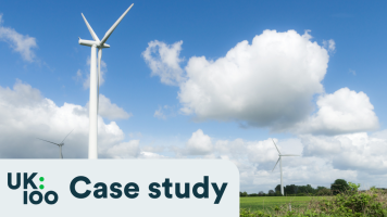 Image of onshore wind farm on sunny day