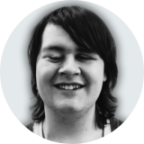 A grayscale portrait of Kelsey Trevett, with dark medium length hair