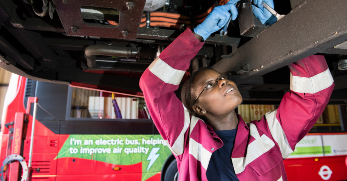 Mechanic working on electric London bus